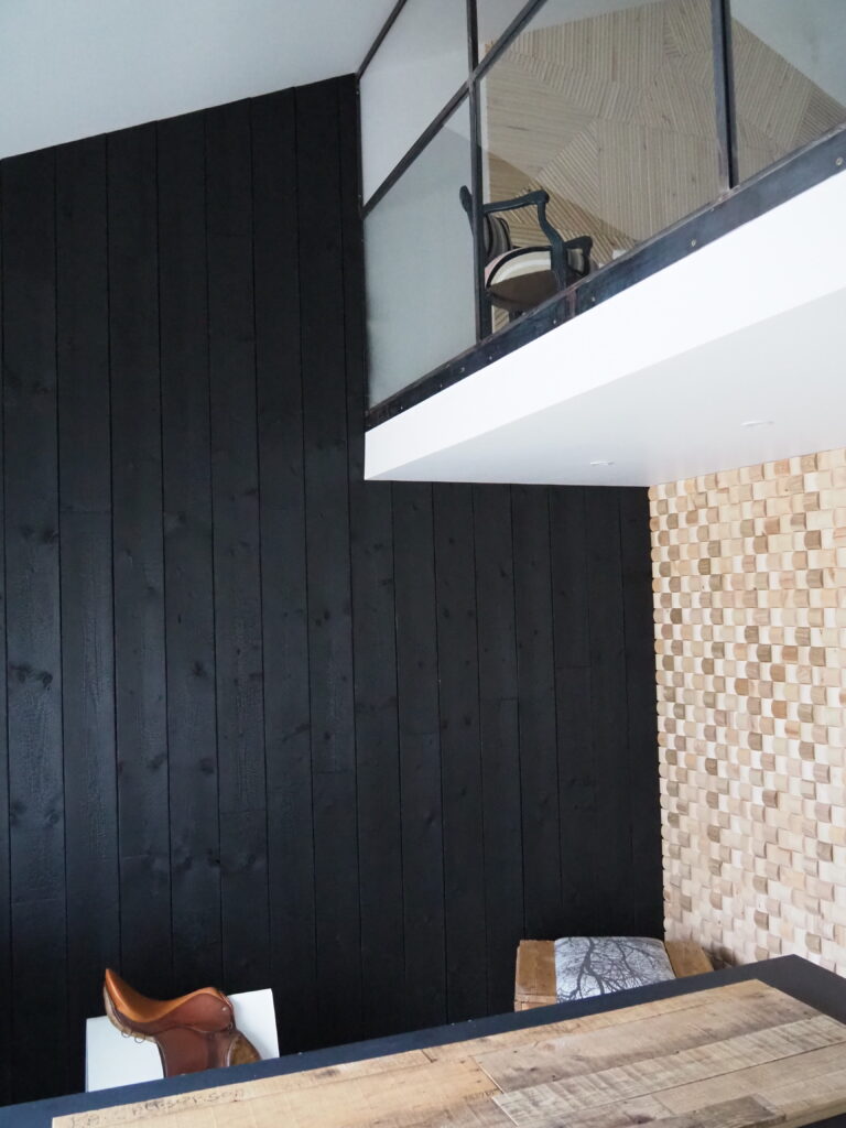 Charred wood and 3D panels, show-room located FR51390